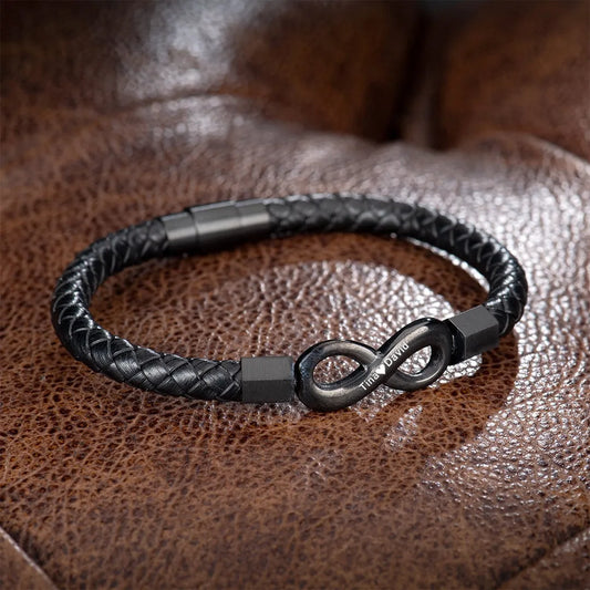 Personalized Muhva Store leather bracelet for husband with two engraved names and infinity design, showcasing the stylish accessory.