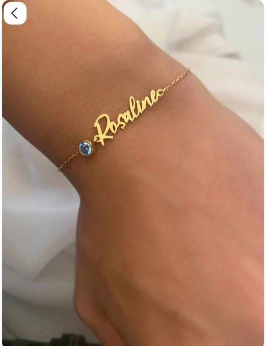 Gold birthstone name bracelet by MUHVA STORE featuring personalized engraved name and colorful birthstone charm.