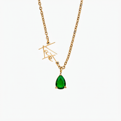 Personalized birthstone necklace with a pendant featuring a colorful gemstone and custom engraving, crafted by MUHVA STORE.