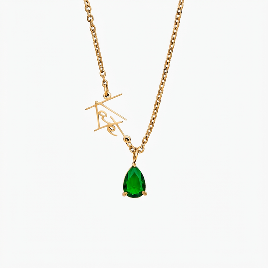 Personalized birthstone necklace with a pendant featuring a colorful gemstone and custom engraving, crafted by MUHVA STORE.