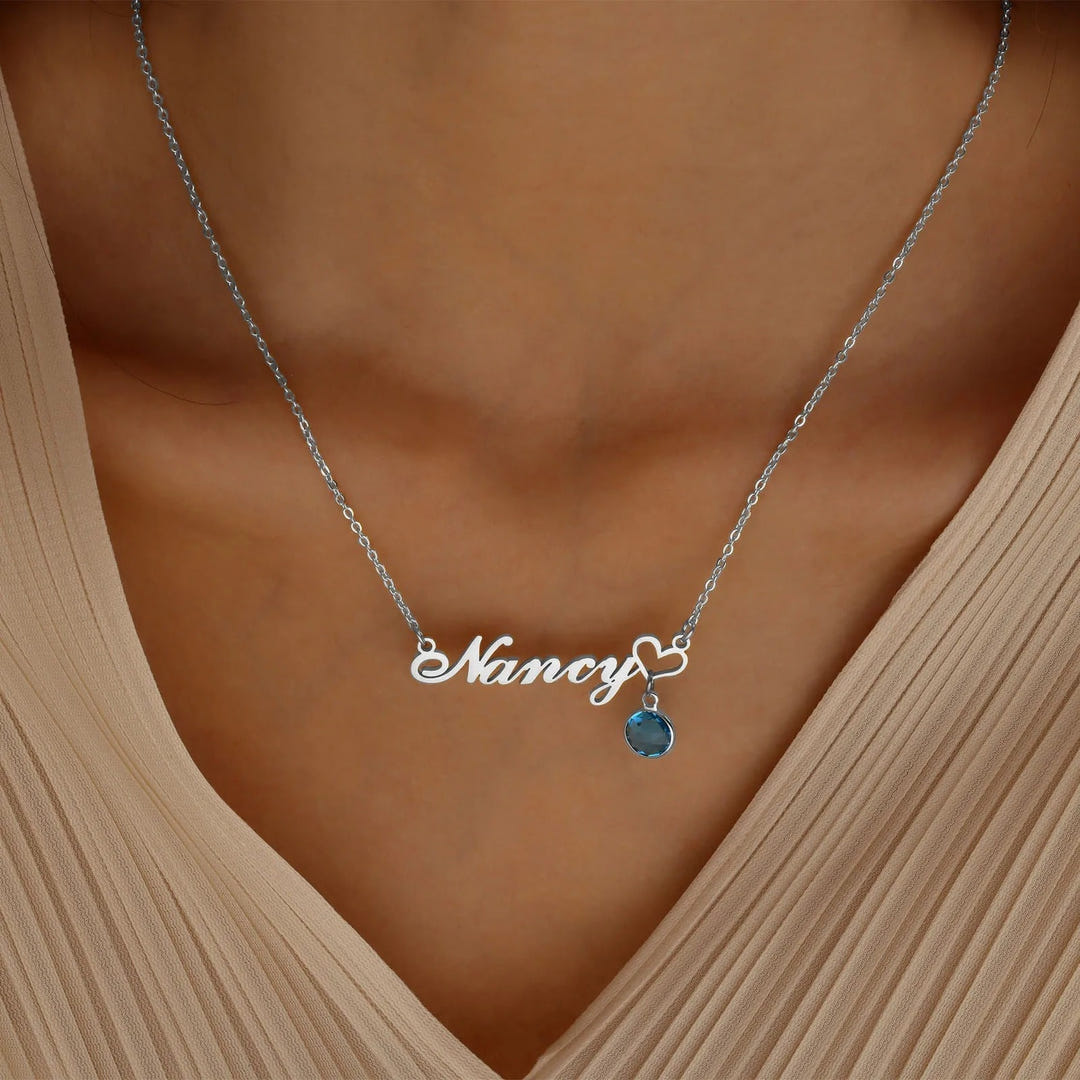 Personalized name necklace from MUHVA STORE with a delicate chain and custom engraved name pendant in elegant design.