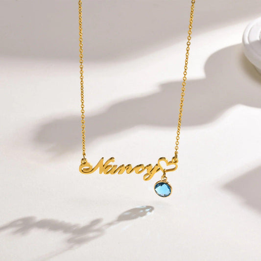 Personalized name necklace with custom text in elegant gold finish, featuring a delicate chain and stylish design from MUHVA STORE.