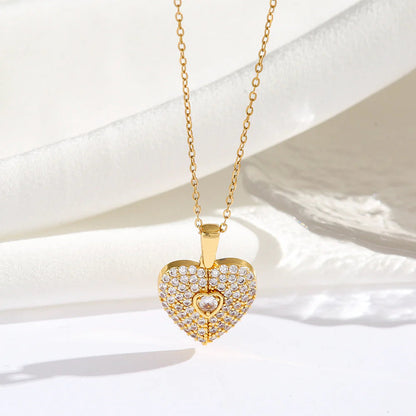 Personalized heart pendant necklace with engraved custom message, featuring a silver chain and heart-shaped charm, from MUHVA STORE.