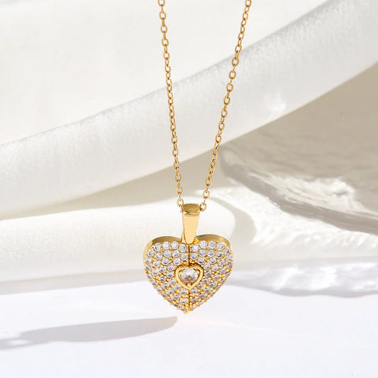Personalized heart pendant necklace with engraved custom message, featuring a silver chain and heart-shaped charm, from MUHVA STORE.
