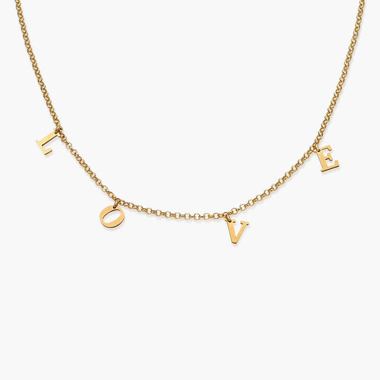 Personalized letter necklace from MUHVA STORE featuring a delicate chain and a custom initial pendant on a white background.