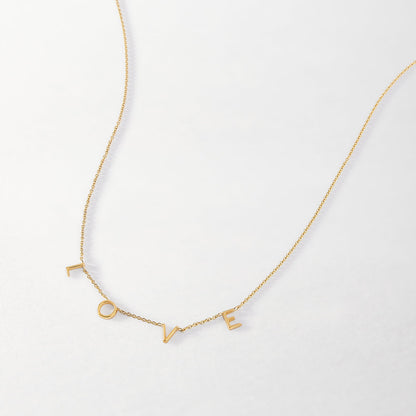 Personalized letter necklace from MUHVA STORE featuring a custom initial pendant on a delicate chain.