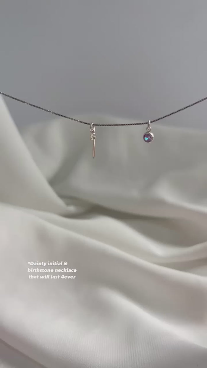 Arabic initial birthstone necklace featuring a personalized initial pendant with a sparkling birthstone, stylish jewelry from MUHVA STORE