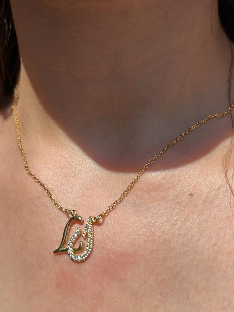 Custom duo initial necklace with two engraved initials on a delicate chain, crafted by MUHVA STORE.