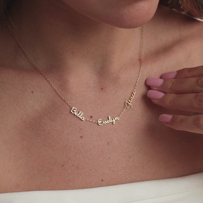 Tiny multiple name necklace by MUHVA STORE featuring delicate gold chain and personalized name pendants.