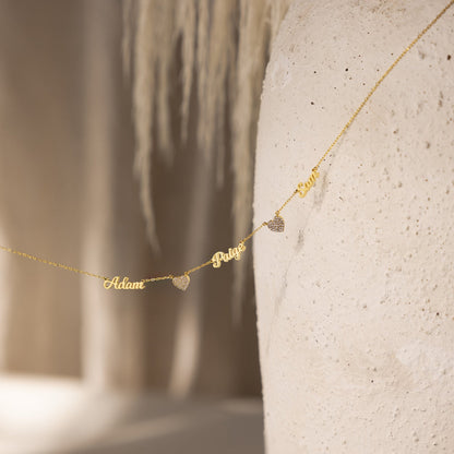 Personalized heart-shaped name necklace from MUHVA STORE featuring a custom engraved name on a silver chain.