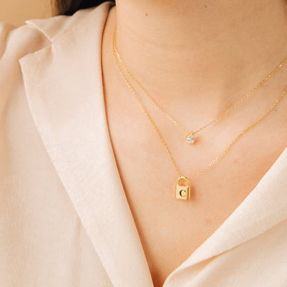 Rae Diamond Pendant Necklace by MUHVA STORE featuring a sparkling diamond pendant on a delicate chain.