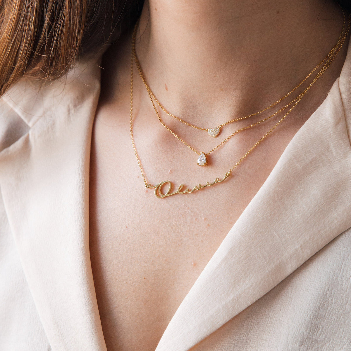 Rae Diamond Pendant Necklace by MUHVA STORE featuring a sparkling diamond pendant on a delicate chain.