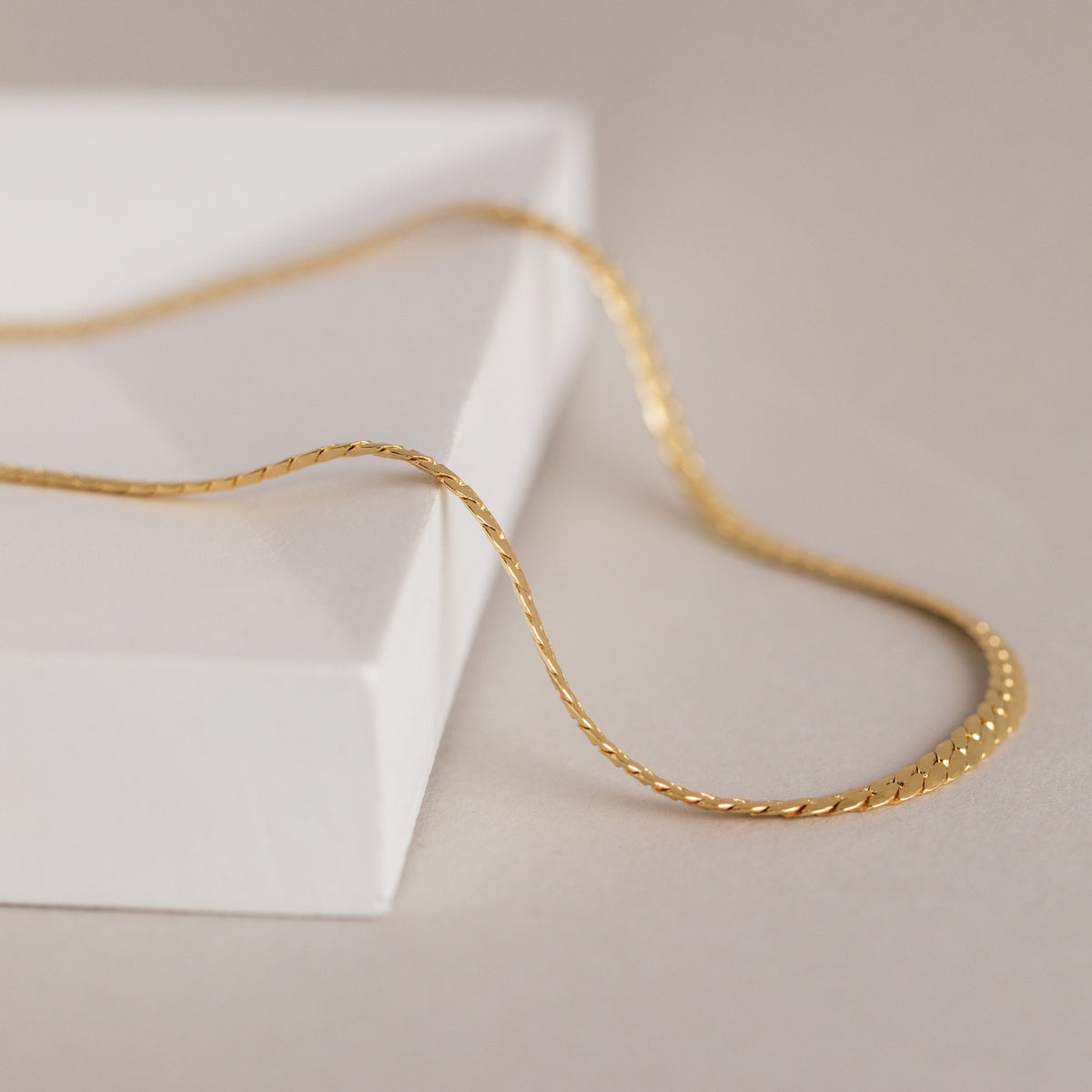 Men's snake chain necklace by MUHVA STORE featuring a sleek, polished silver design with a smooth, flexible link chain.