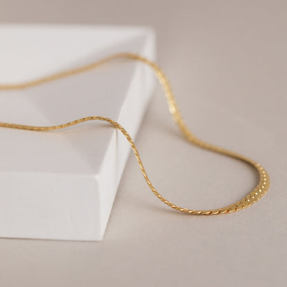 Men's snake chain necklace by MUHVA STORE featuring a sleek, polished silver design with a smooth, flexible link chain.