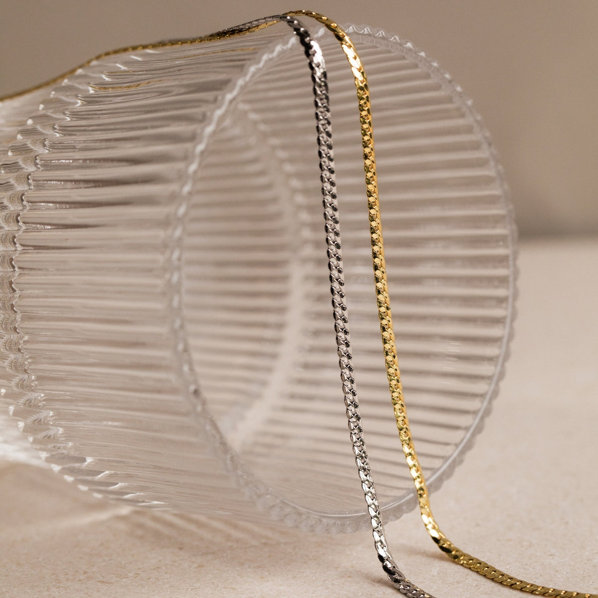 Men's snake chain necklace by MUHVA STORE featuring a sleek, polished silver design on a plain background.
