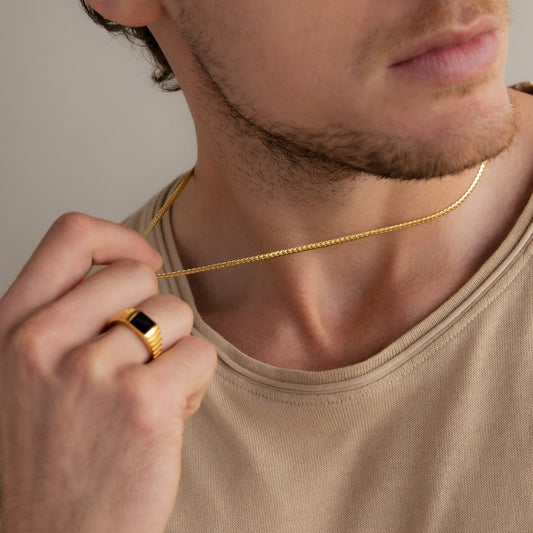 Men's snake chain necklace with a sleek, polished silver finish, featuring a sturdy clasp from MUHVA STORE.