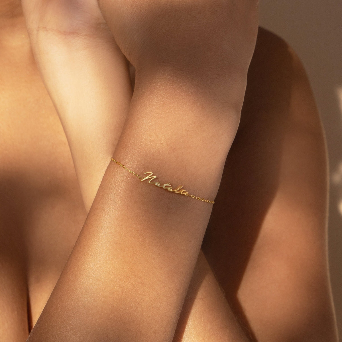 Personalized name bracelet from MUHVA STORE with custom engraved name in elegant silver design.