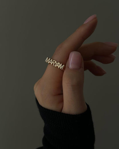 Personalized Luxe Name Ring from MUHVA STORE featuring a sleek band with custom engraved name in elegant style.