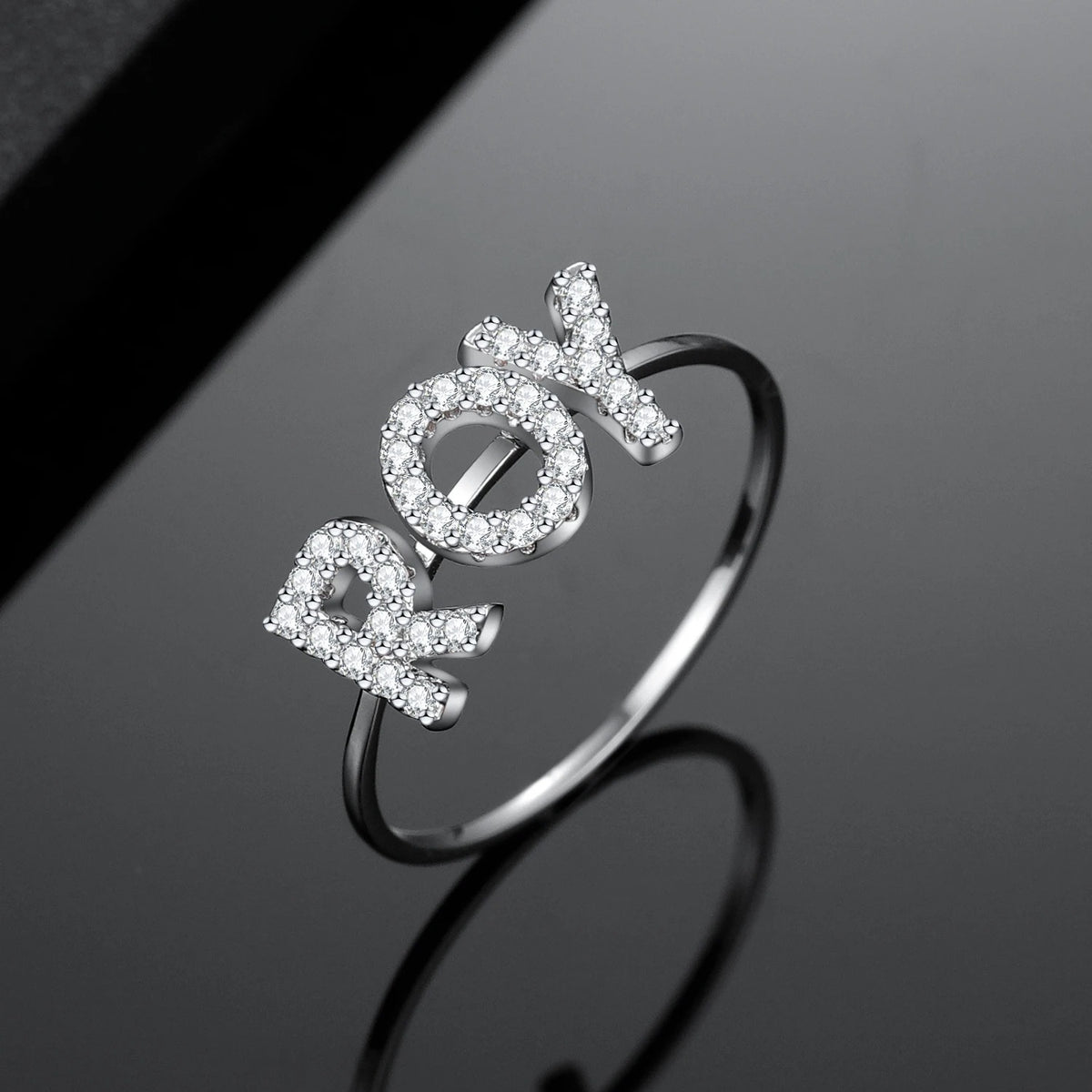 Elegant diamond name ring from MUHVA STORE featuring a personalized engraved name with sparkling diamonds on a sleek band.