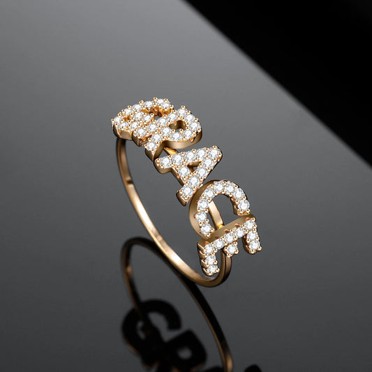 Elegant diamond name ring from MUHVA STORE featuring sparkling diamonds and personalized design on a sleek band.