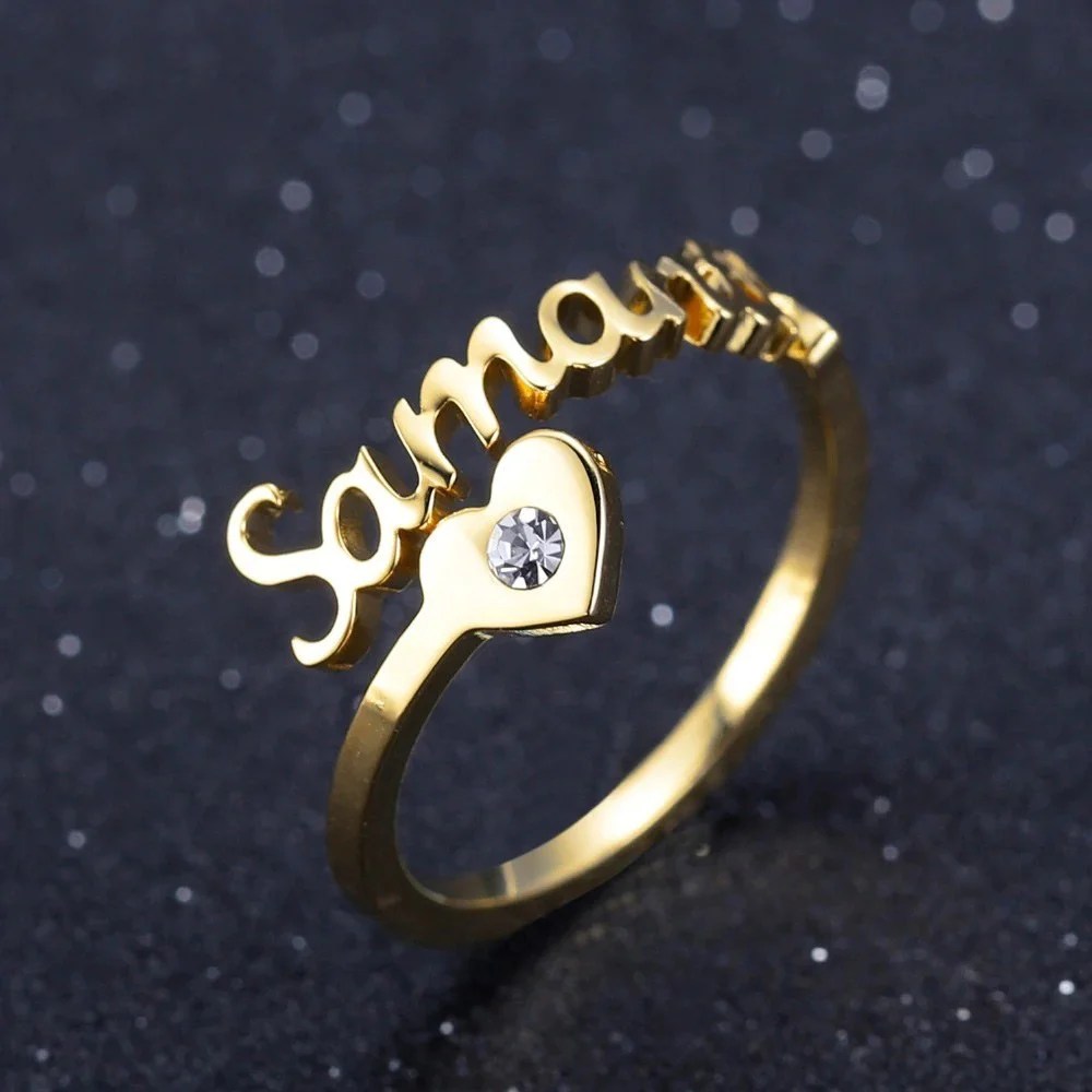 Elegant diamond spiral name ring by MUHVA STORE featuring a personalized engraved design and sparkling diamond accents.