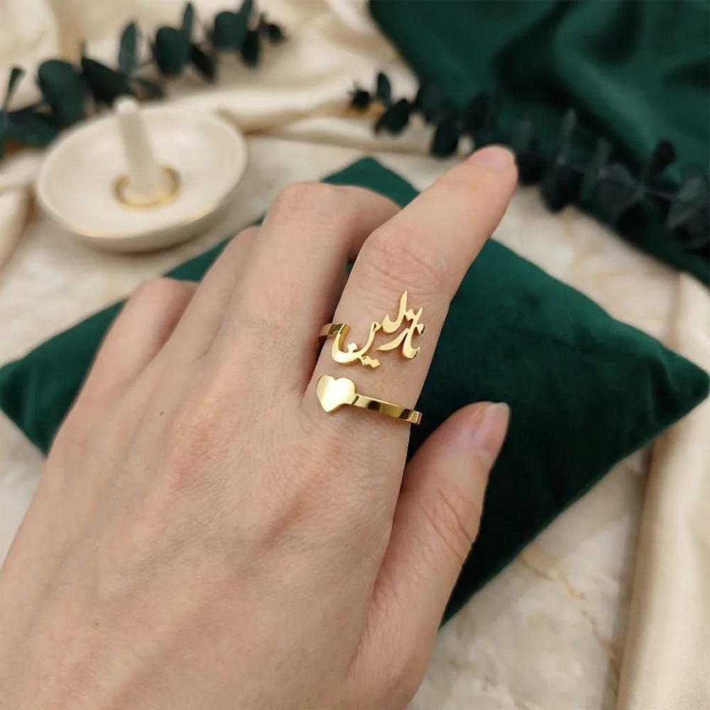 Elegant Arabic Heart Name Ring by MUHVA STORE featuring a personalized name engraved in a heart-shaped design.