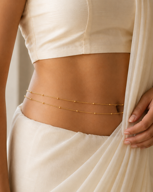 Double layer waist chain by MUHVA STORE featuring layered gold chains for stylish waist jewelry.