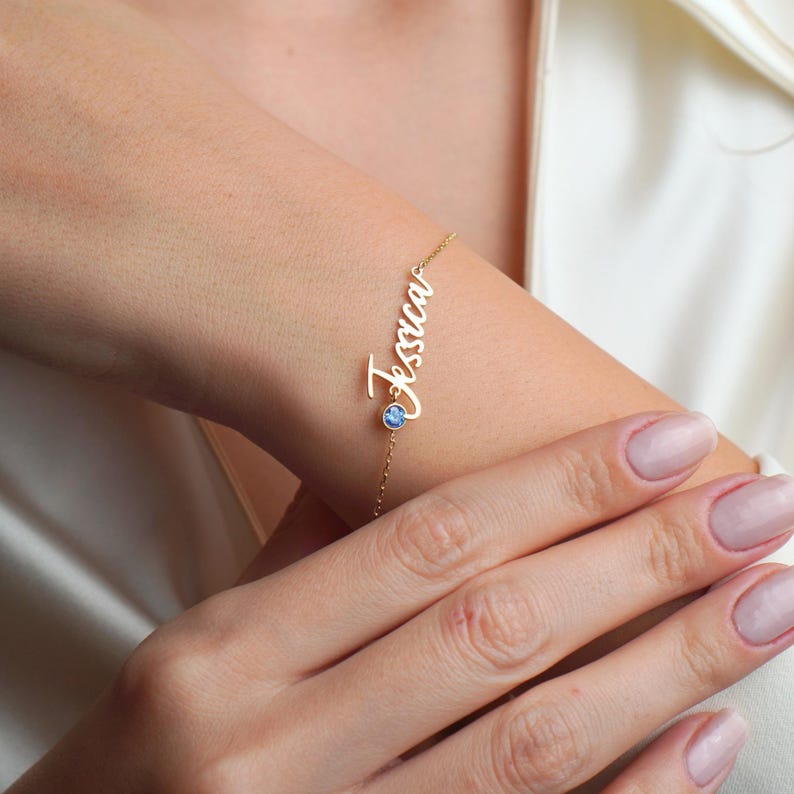Personalized birthstone name bracelet by MUHVA STORE featuring custom engraved name and a sparkling birthstone charm.
