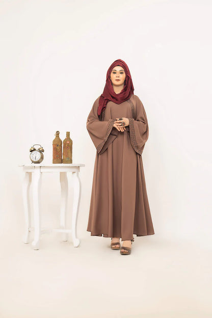 SAYADA by MUHVA STORE, stylish modern hijab in soft fabric with intricate embroidery and elegant draping.
