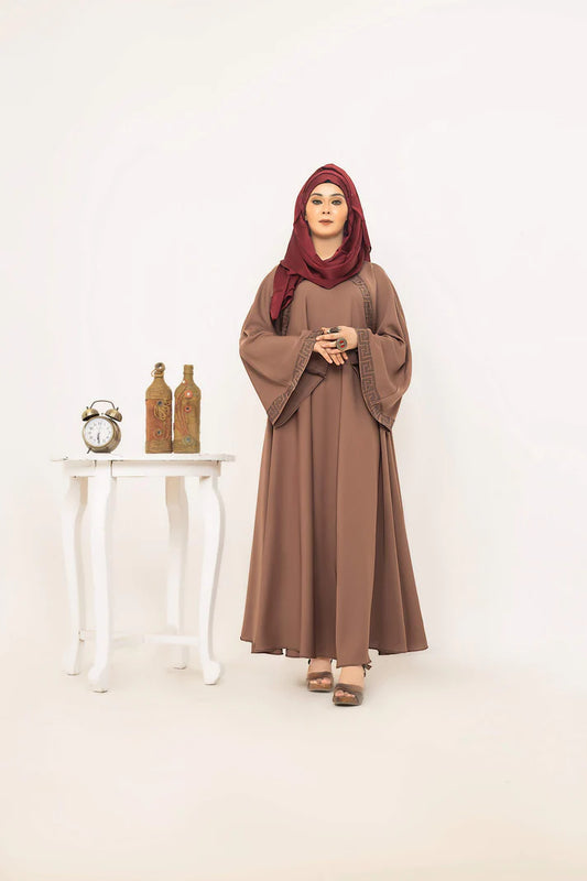 SAYADA by MUHVA STORE, stylish modern hijab in soft fabric with intricate embroidery and elegant draping.