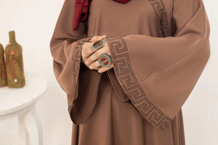 SAYADA handmade leather handbag by MUHVA STORE featuring a sleek design with a top handle and gold-tone hardware.