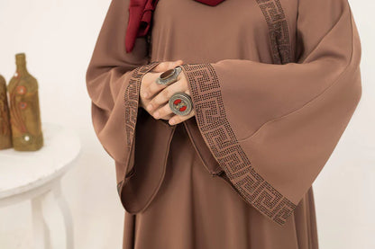 SAYADA handmade leather handbag by MUHVA STORE featuring a sleek design with a top handle and gold-tone hardware.