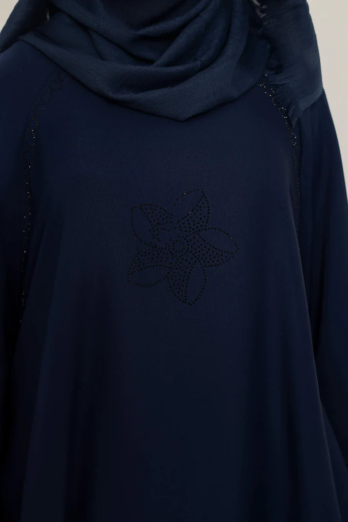 Hadeel floral patterned fabric by Muhva Store, close-up showing vibrant colorful design and intricate details.