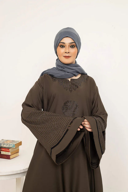 MUHVA STORE SHOROOQ in black with intricate embroidery, showcasing detailed craftsmanship and stylish design.