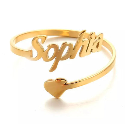 Pair of adjustable custom name rings from Muhva Store, featuring personalized engraved designs on silver-colored bands.
