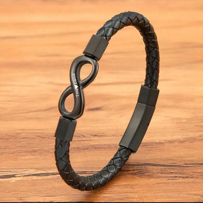 Personalized leather bracelet for husband with engraved two names and infinity symbol, featuring a sleek brown leather band.