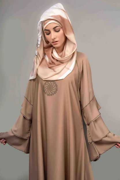 MuHVA STORE Nasra handbag in beige with gold accents, featuring a structured design and top handle for versatile style.