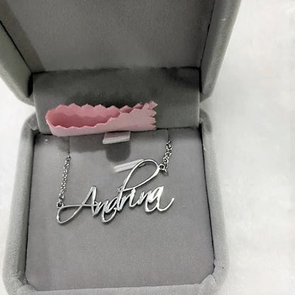 Custom script name necklace with cursive hand-lettered pendant, featuring personalized name design from MUHVA STORE.