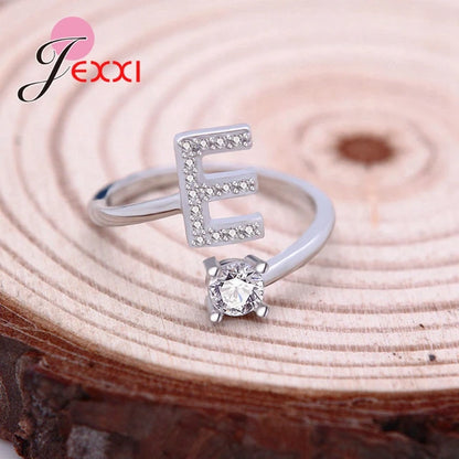 Pair of initial letter rings from MUHVA STORE featuring stylish gold-tone designs with engraved letter R, perfect for personalized jewelry.
