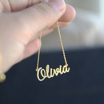 Personalized name necklace from Muhva Store featuring a custom engraved pendant on a delicate chain.