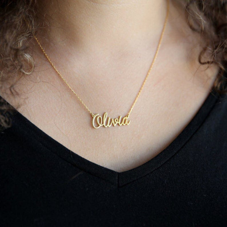 Personalized name necklace from Muhva Store with custom engraved name pendant on a delicate chain.