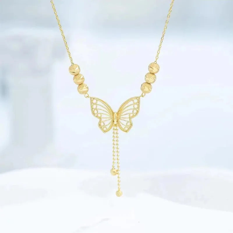 Butterfly design necklace set by MUHVA STORE featuring titanium steel butterfly tassel and lucky beads for women's fashion.