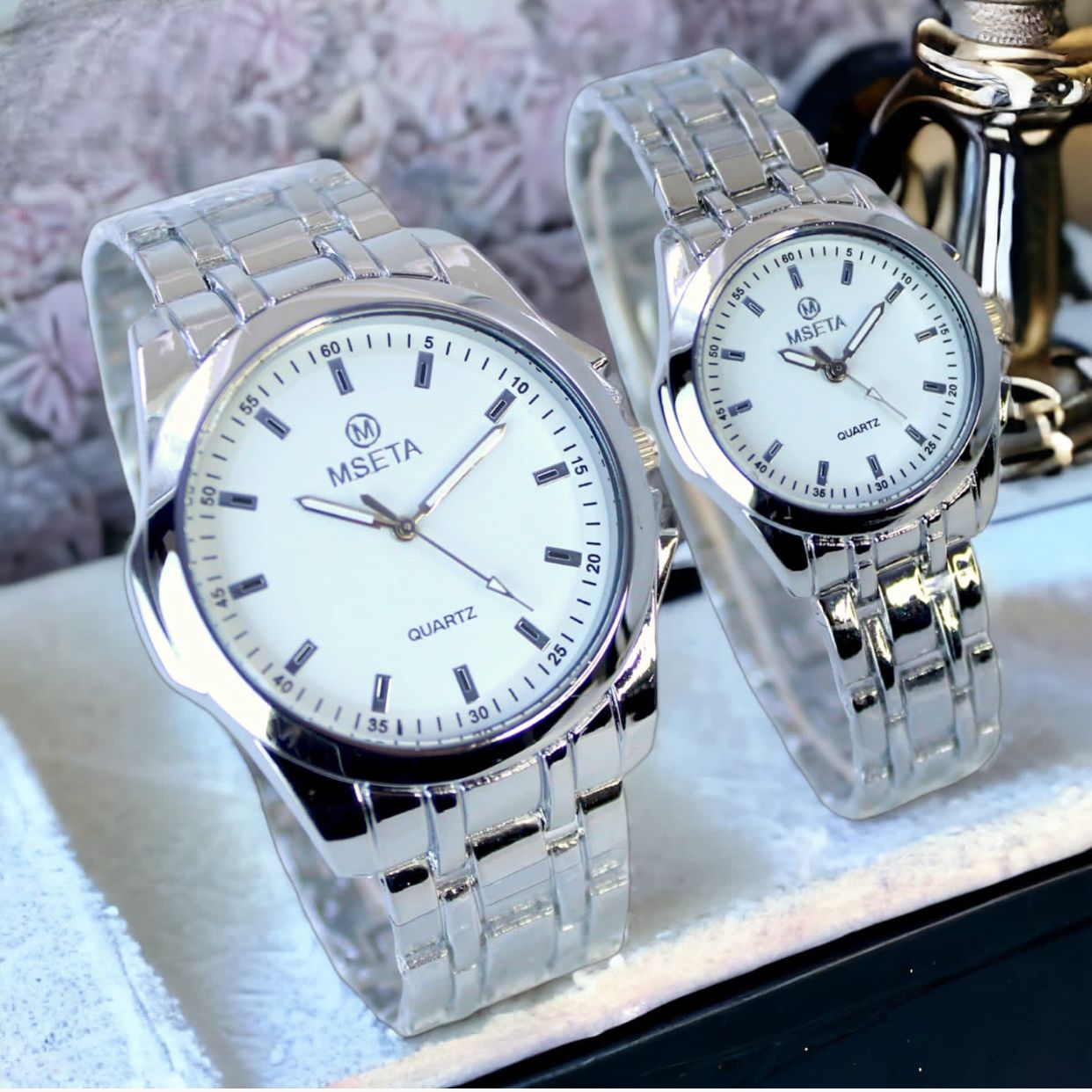 Muhva Store MSETA Couple Watch M-004 with matching stainless steel bands and round dial, designed for couples.