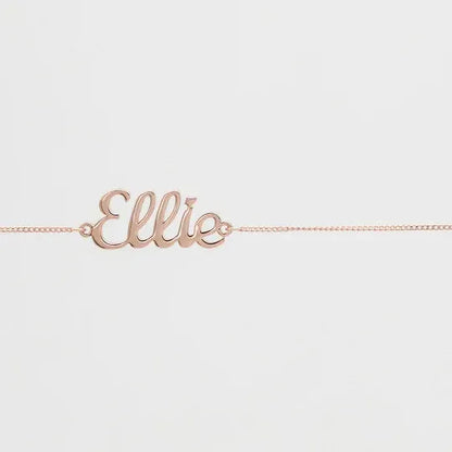 Custom name belly chain by Muhva Store featuring a delicate gold chain design on a neutral background.