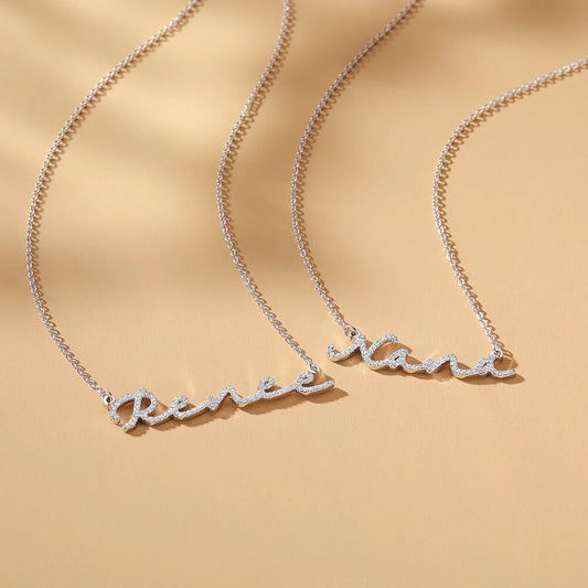 Zircon infused signature name necklace by MUHVA STORE featuring a personalized pendant with sparkling zircon stones on a delicate chain.
