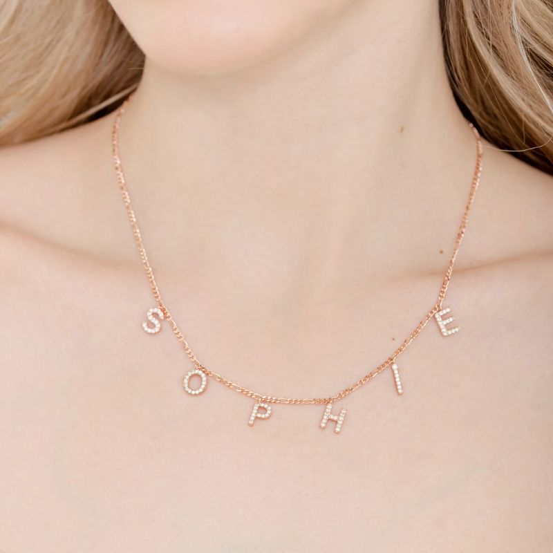 Letter necklace and bracelet set with gold-tone chains and alphabet charms, stylish accessories from MUHVA STORE.