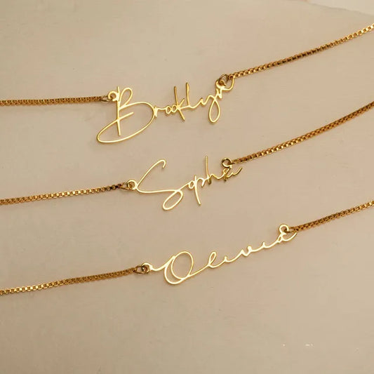 Pack of 2 personalized name necklaces from Muhva Store featuring stylish, custom engraved jewelry on a sleek chain.