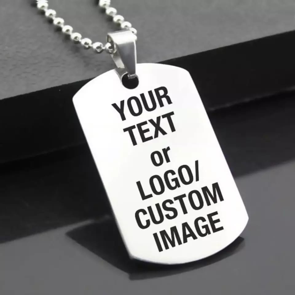 Two silver personalized pendants with engraved designs, showcasing a classic style, perfect for custom jewelry accessories.