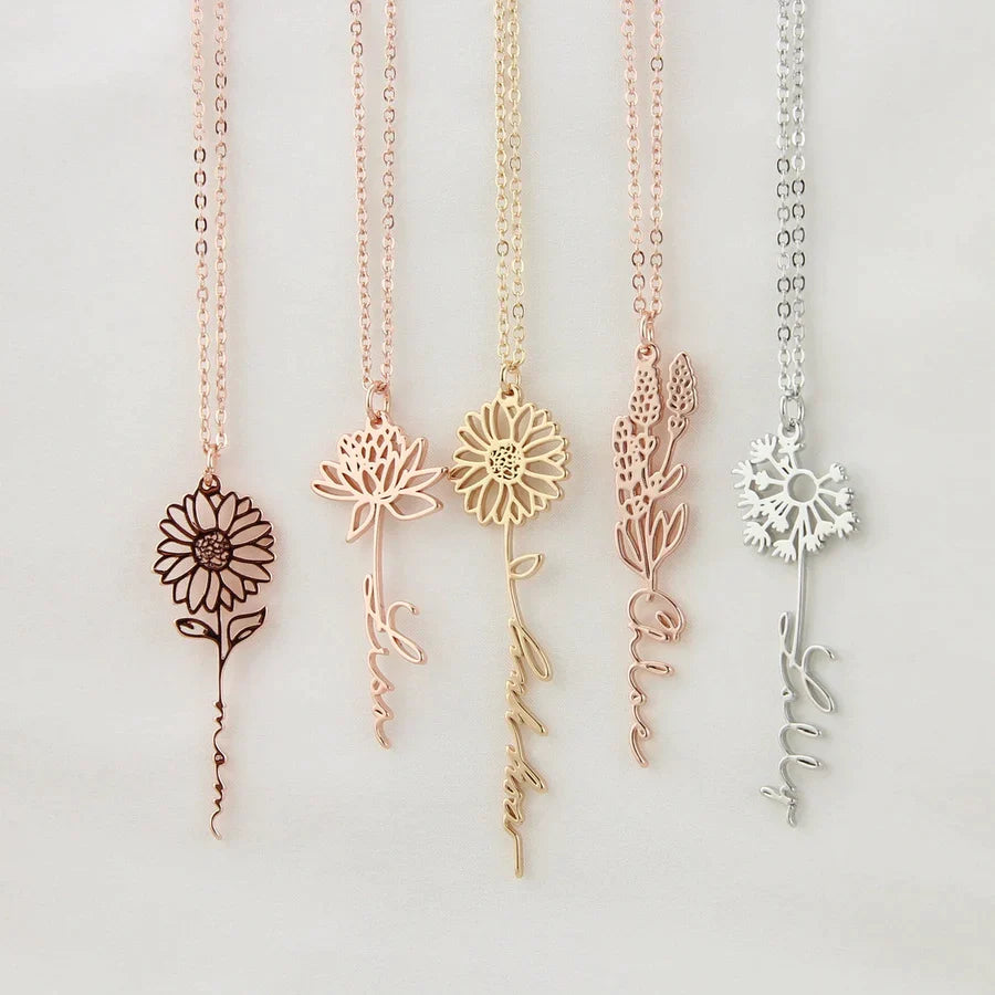 Personalized name necklace with a birth flower pendant, elegant jewelry piece by MUHVA STORE featuring custom engraving and floral detail.