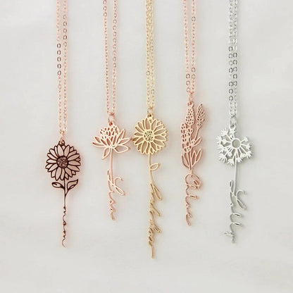 Personalized name necklace with a birth flower pendant, elegant jewelry piece by MUHVA STORE featuring custom engraving and floral detail.